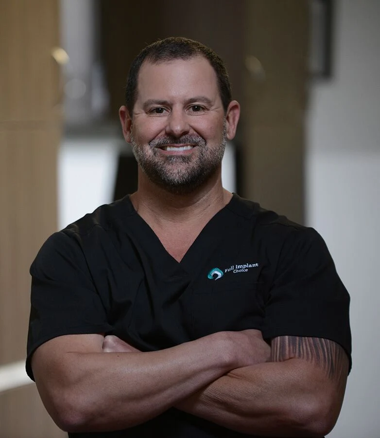 Dr. Adam Hogan, DDS, full-arch implant dentist at Full Implant Choice in Virginia Beach